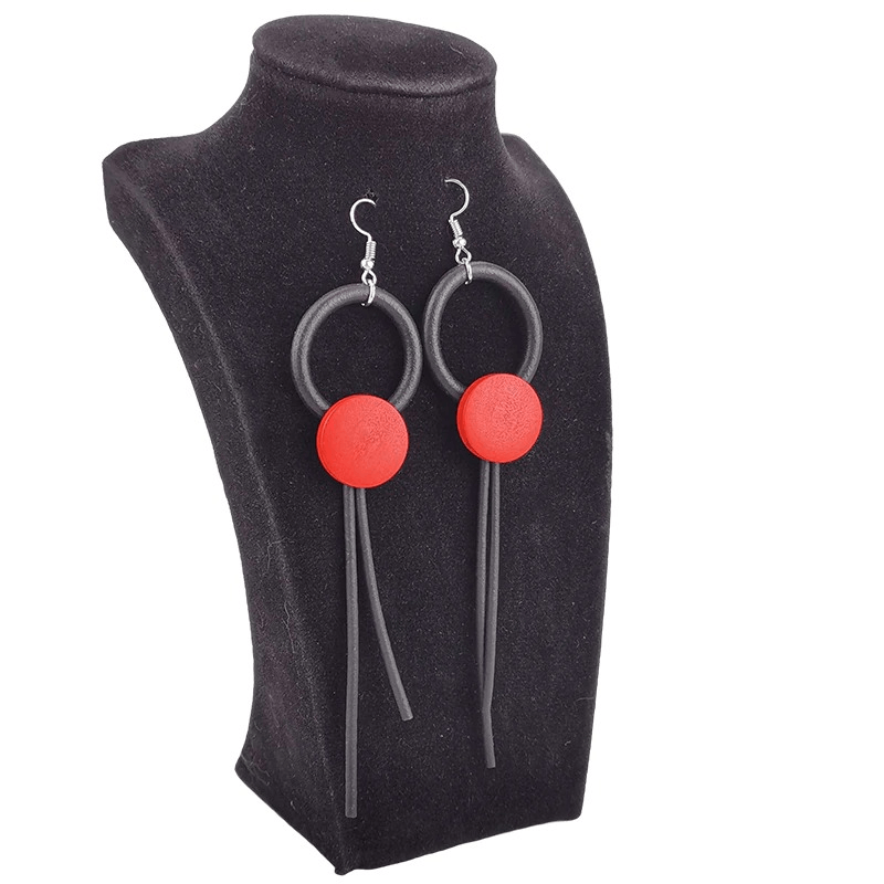 Bold red and black long earrings from wood design, perfect gothic accessory for stylish women.