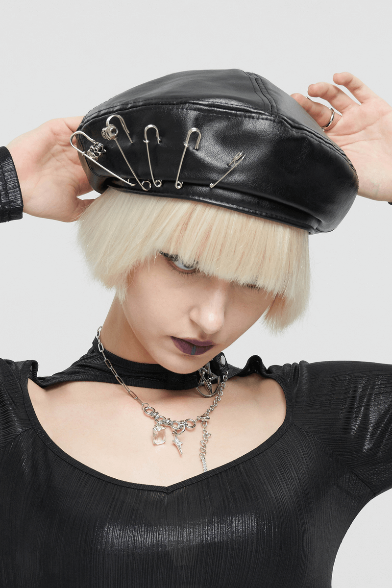 Stylish faux leather beret hat with pins, perfect goth punk accessory for women.