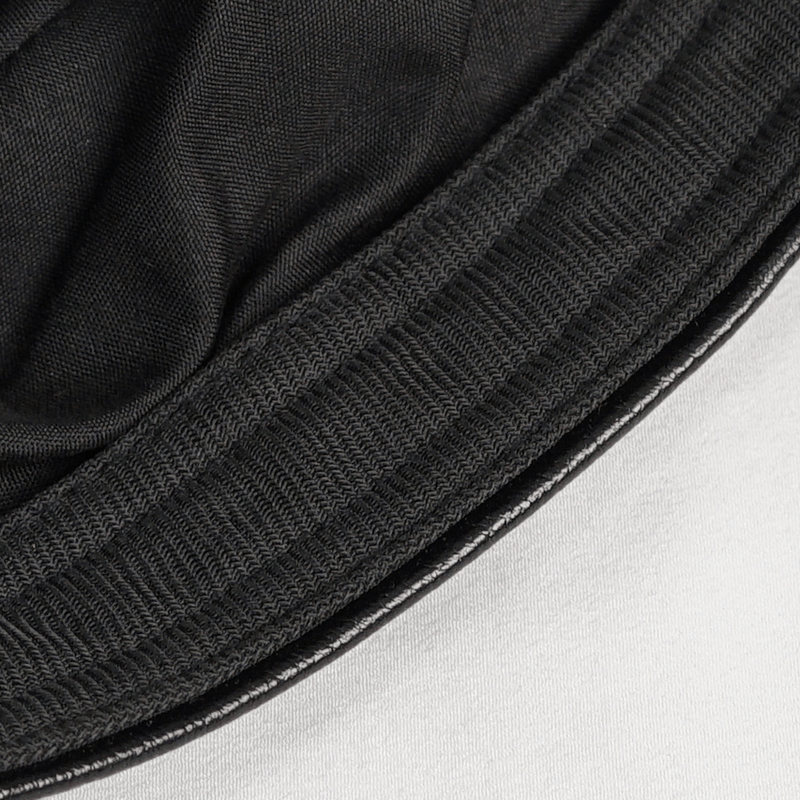 Close-up of the stylish faux leather beret's rim showcasing quality fabric and sleek design.