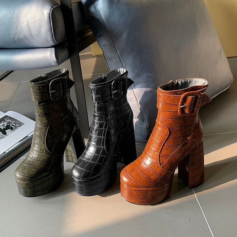 Stylish women's high heel platform ankle boots in black, brown, and green PU leather with buckle design.
