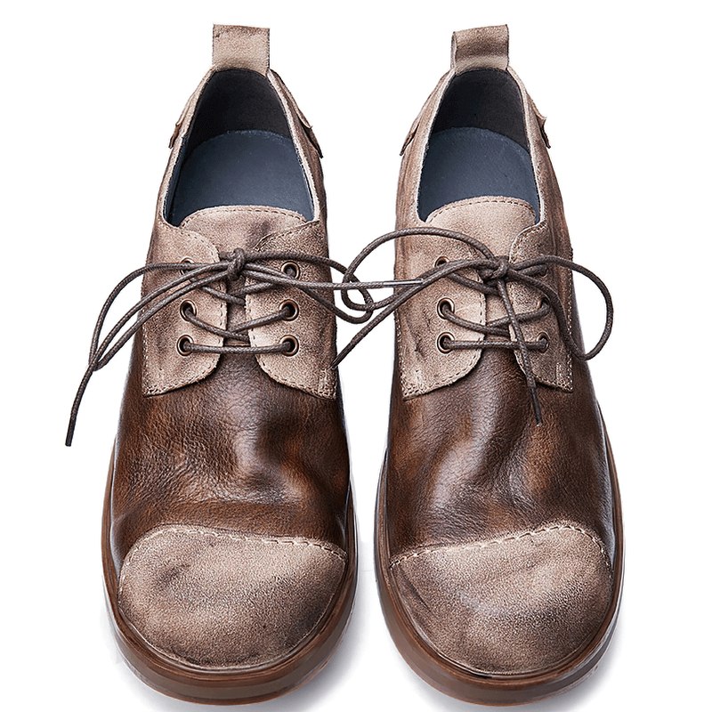 Stylish lace-up cowhide cowboy shoes for men, combining comfort and trendy casual design.