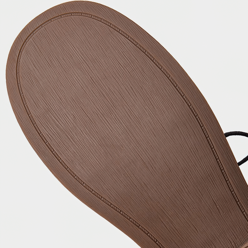 Sole of stylish lace-up cowhide cowboy shoes showcasing textured grip for comfort and style.