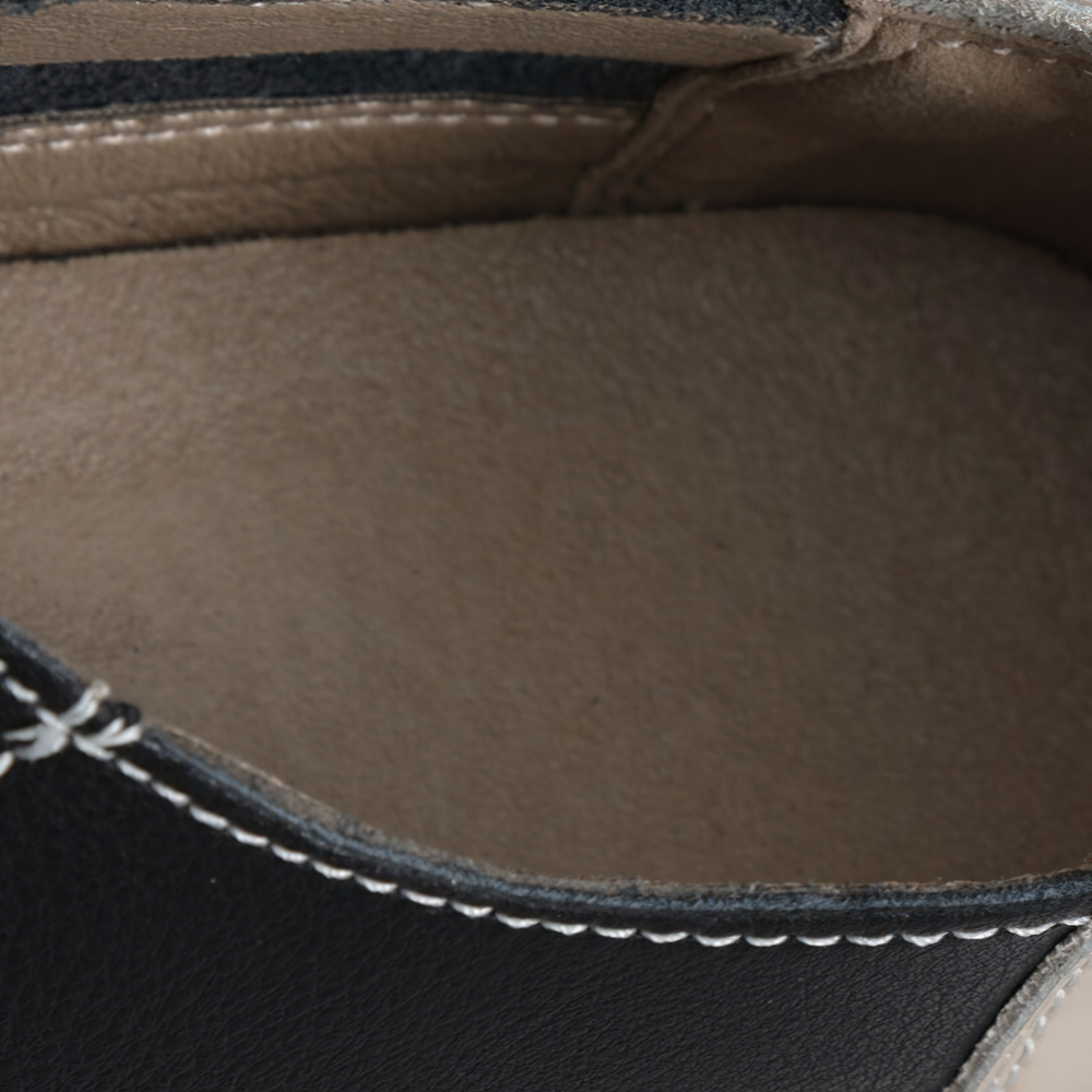 Interior view of stylish ladies genuine leather sneakers showcasing soft lining and quality craftsmanship.