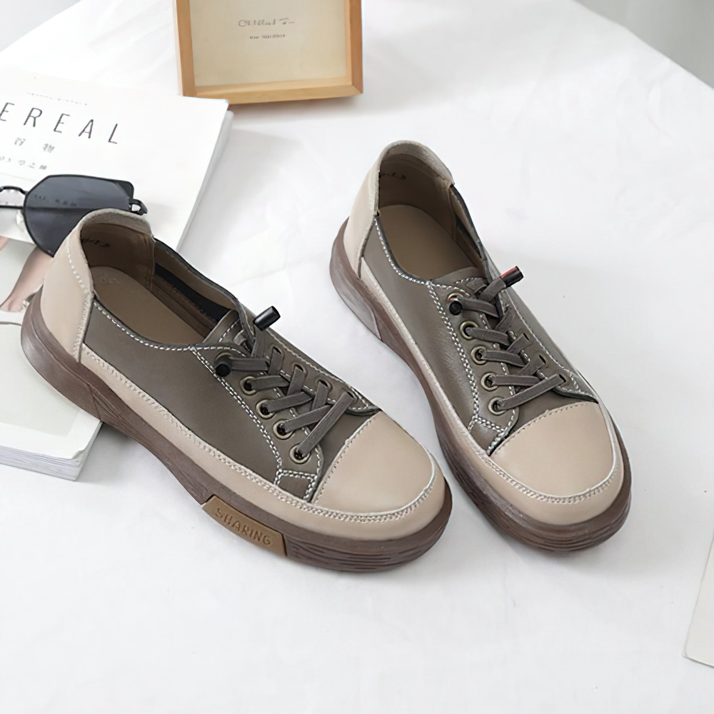 Stylish ladies genuine leather sneakers in beige and gray for casual fashion and comfort.