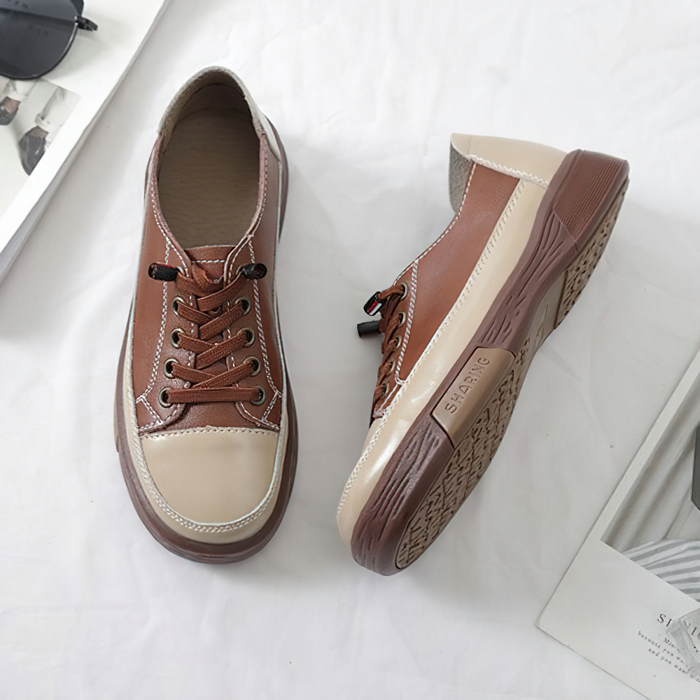 Stylish brown ladies genuine leather sneakers with quality sole, perfect for casual fashion.