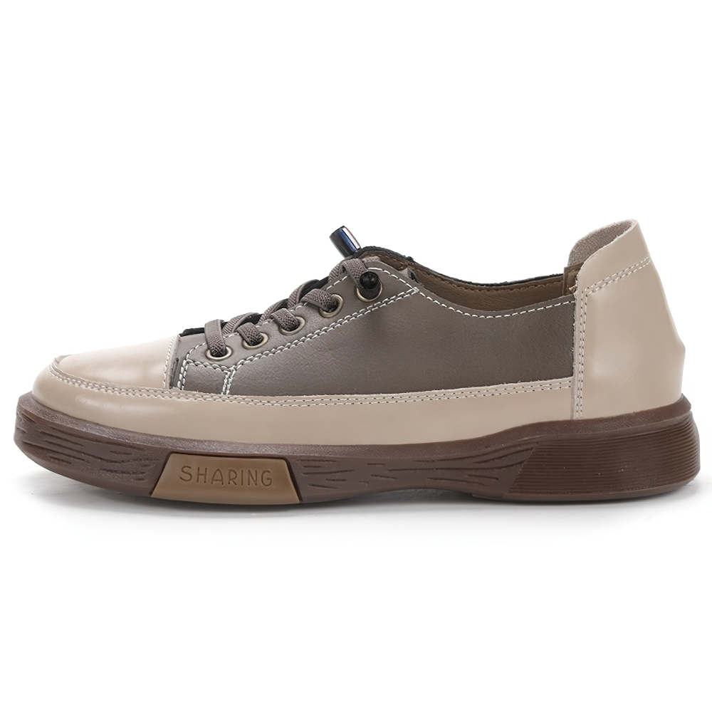 Stylish ladies genuine leather sneakers in beige and brown, perfect for casual wear and comfort.