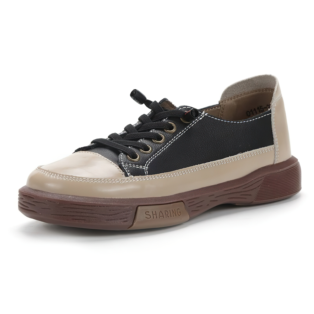 Stylish ladies genuine leather sneakers in black and beige, perfect for casual fashion and comfort, featuring a quality sole.
