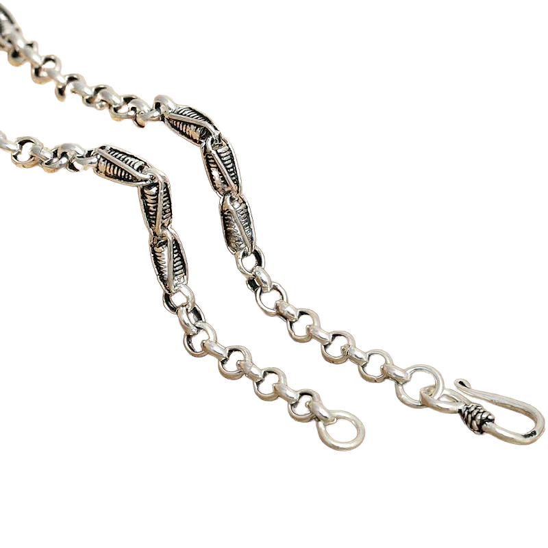 Close-up of a stylish unisex sterling silver chain necklace showcasing intricate link design and clasp.