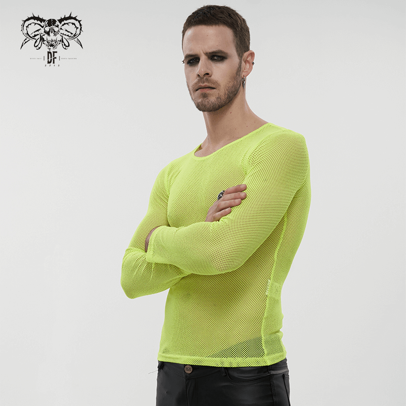 Stylish male model in a bright yellow fluorescent long sleeve mesh top, showcasing alternative fashion style.