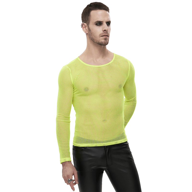 Stylish male model in a fluorescent yellow mesh long sleeve top, showcasing alternative fashion with a bold and eye-catching look.