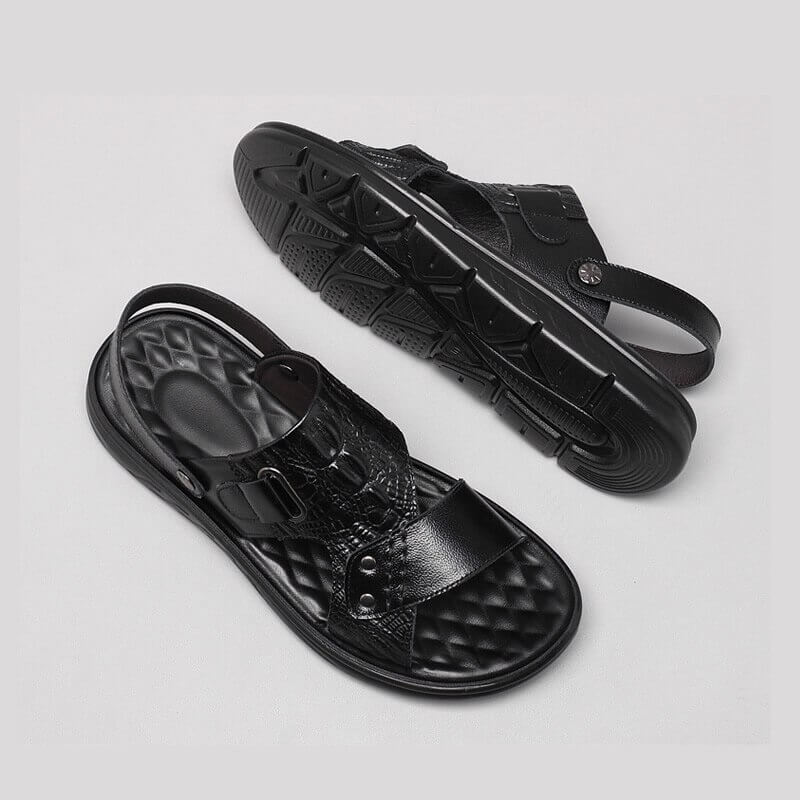 Stylish black men's genuine leather sandals with strap buckle, featuring a lightweight and comfortable design.