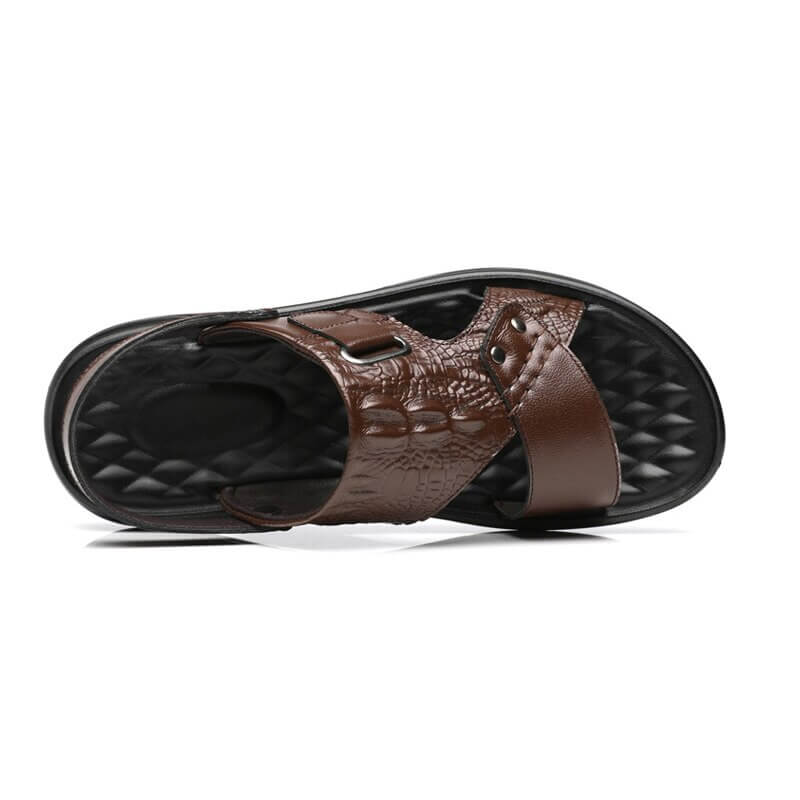 Stylish men's brown leather sandals with strap buckle, lightweight design for casual daily wear.