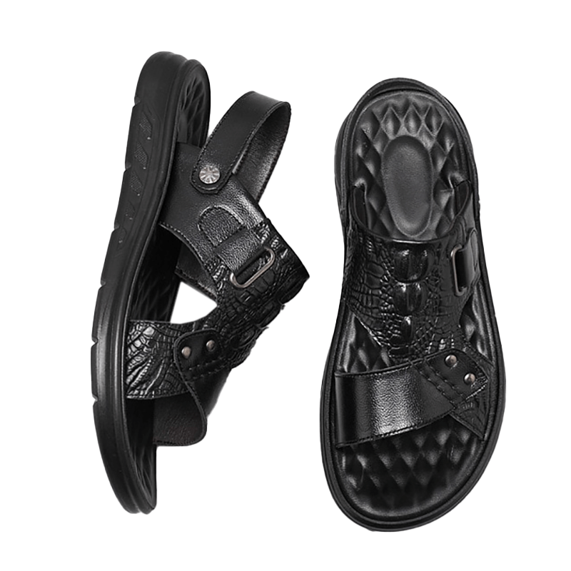 Stylish black leather sandals with strap buckle, designed for comfort and perfect fit for men.