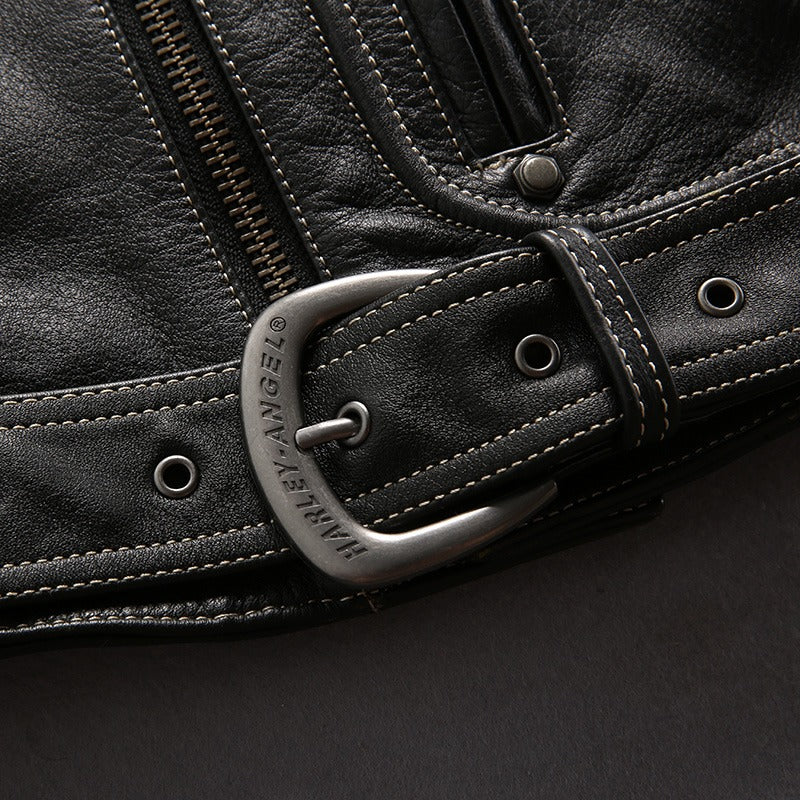 Close-up of a stylish multi-pocket leather jacket belt buckle, highlighting craftsmanship and biker style essentials.
