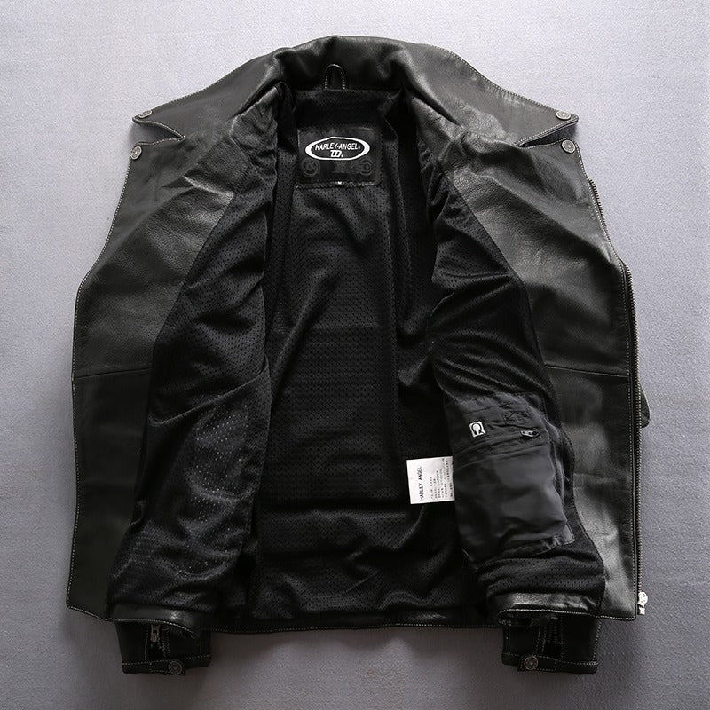 Interior view of stylish multi-pocket genuine leather motorcycle jacket showcasing its sleek design and comfortable lining.