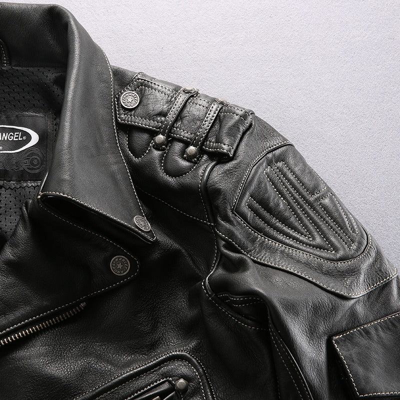 Close-up of a stylish multi-pocket genuine leather motorcycle jacket showcasing its detailed stitching and robust design.