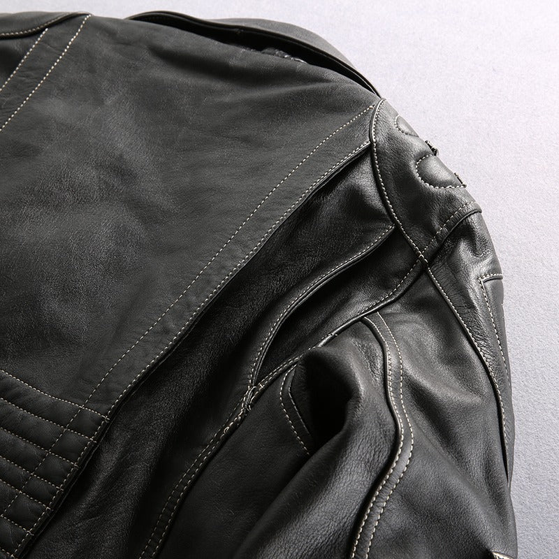 Stylish multi-pocket genuine leather motorcycle jacket showcasing intricate stitching and sleek design for bikers.