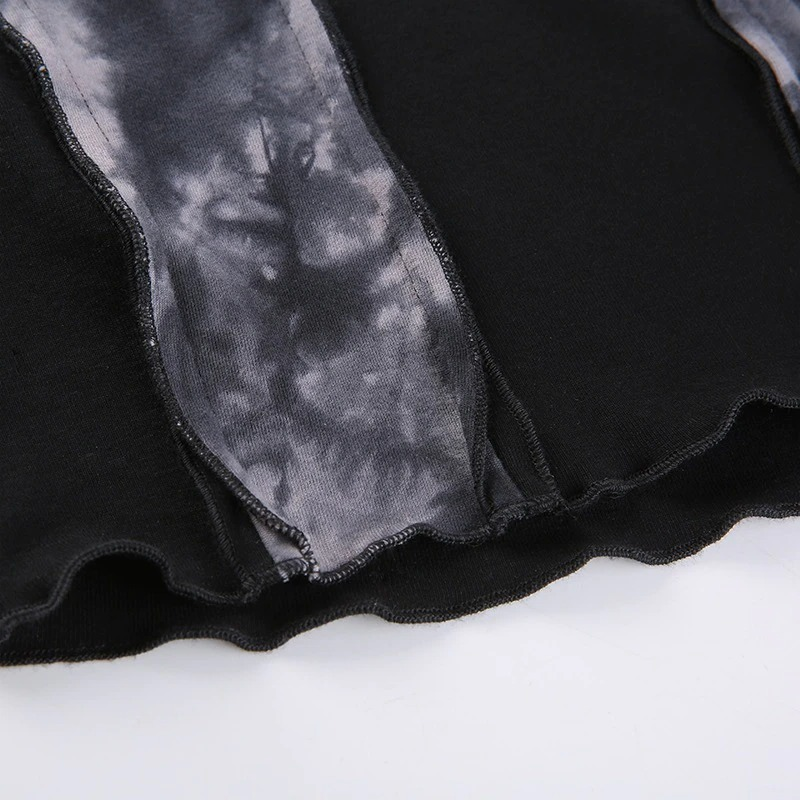 Close-up of stylish O-neck crop top with unique black and gray fabric detailing, perfect for gothic punk fashion.