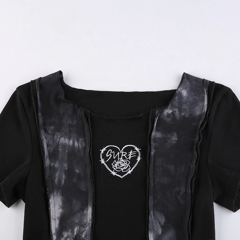 Stylish women's gothic crop top with detachable sleeves and heart graphic detail.