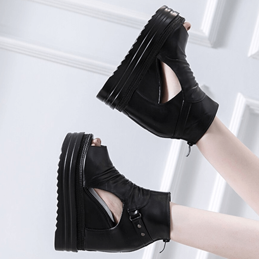 Stylish black open-toe ankle boots for women with a hollow out design and wedge heel, perfect for casual fashion.