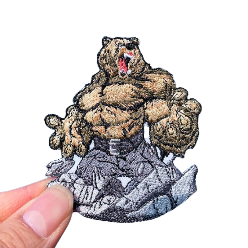 Stylish patch featuring a muscular, angry bear design, perfect for personalizing clothing in alternative fashion.