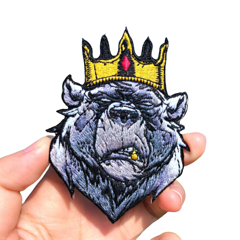 Stylish bear patch with a crown, perfect gothic accessory for alternative rock fashion clothing.