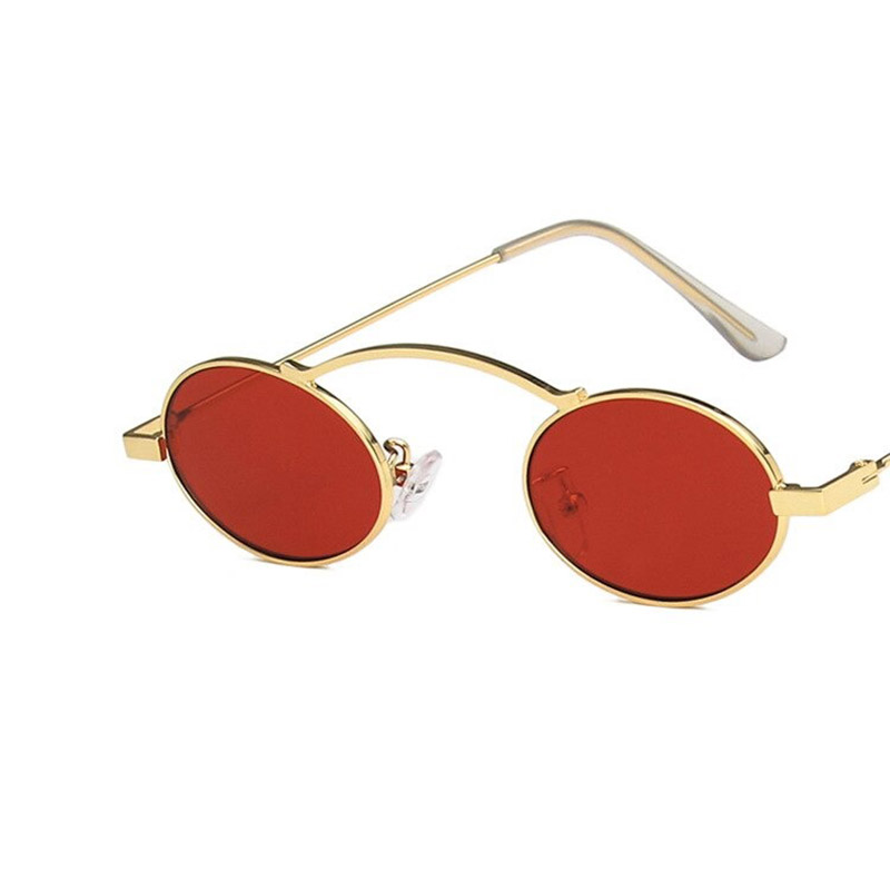 Stylish small oval steampunk sunglasses with red lenses and gold frame, perfect UV400 sun protection accessory.