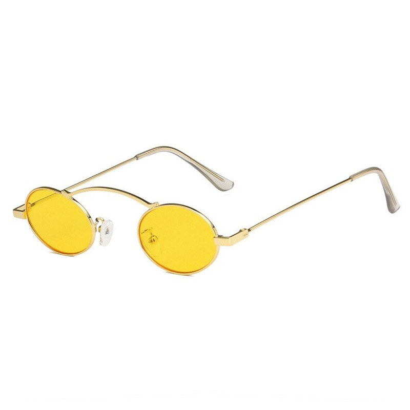Stylish small oval steampunk sunglasses with yellow lenses and gold frames, perfect for trendy accessorizing.