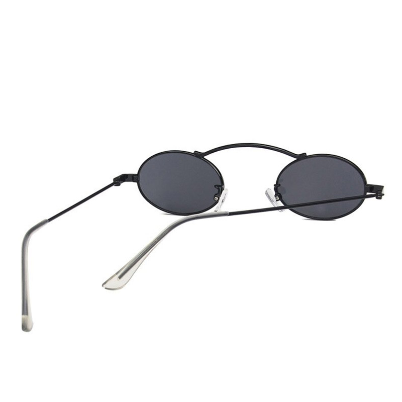 Stylish women's small oval steampunk sunglasses with black lenses and unique frame design.