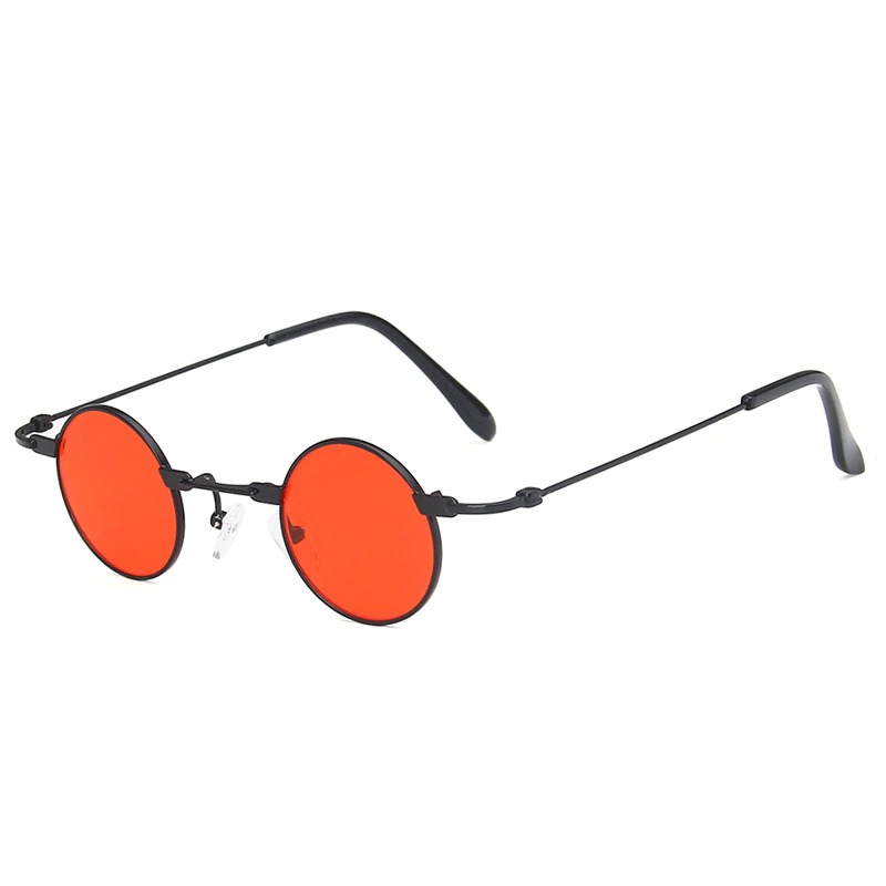 Unisex small round steampunk sunglasses with striking red lenses and sleek black frames, perfect fashionable accessory.
