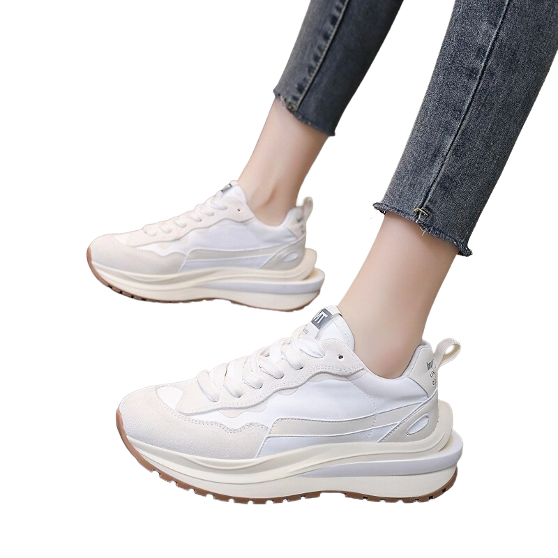 Stylish women's genuine leather sneakers in white, perfect for casual wear with trendy chunky sole.