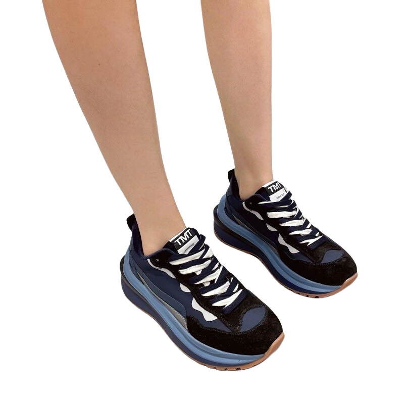 Stylish women's chunky sneakers in blue and black, perfect for casual wear and adding a trendy touch.