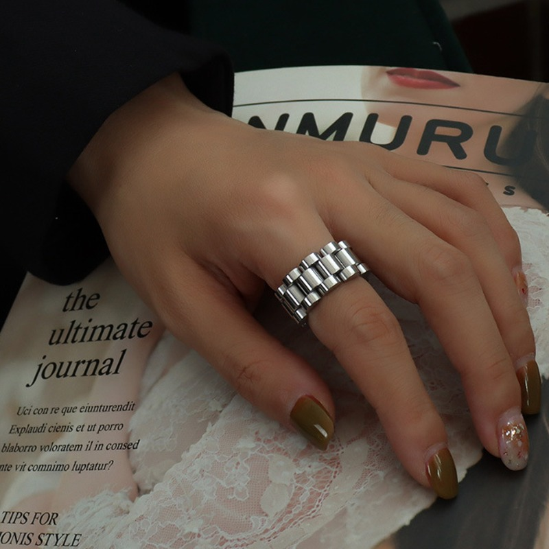 Stylish unisex chunky chain ring on hand, showcasing high polished stainless steel design in alternative fashion.