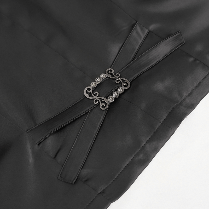 Elegant black waistcoat back detail with patterned metal buttons and stylish belt closure.