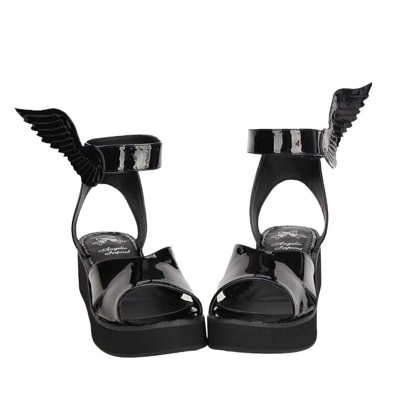 Stylish women's black winged sandals with low platform, perfect for casual gothic alternative fashion.