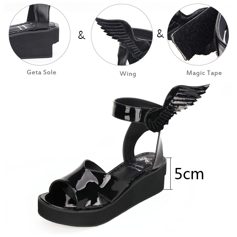 Stylish women's black winged sandals with low platform and adjustable strap, perfect for alternative fashion.