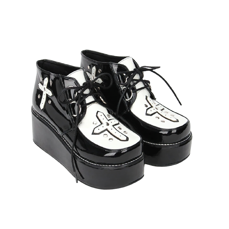 Stylish women gothic shoes with rivet cross design and lace-up, featuring high platform soles in black and white.