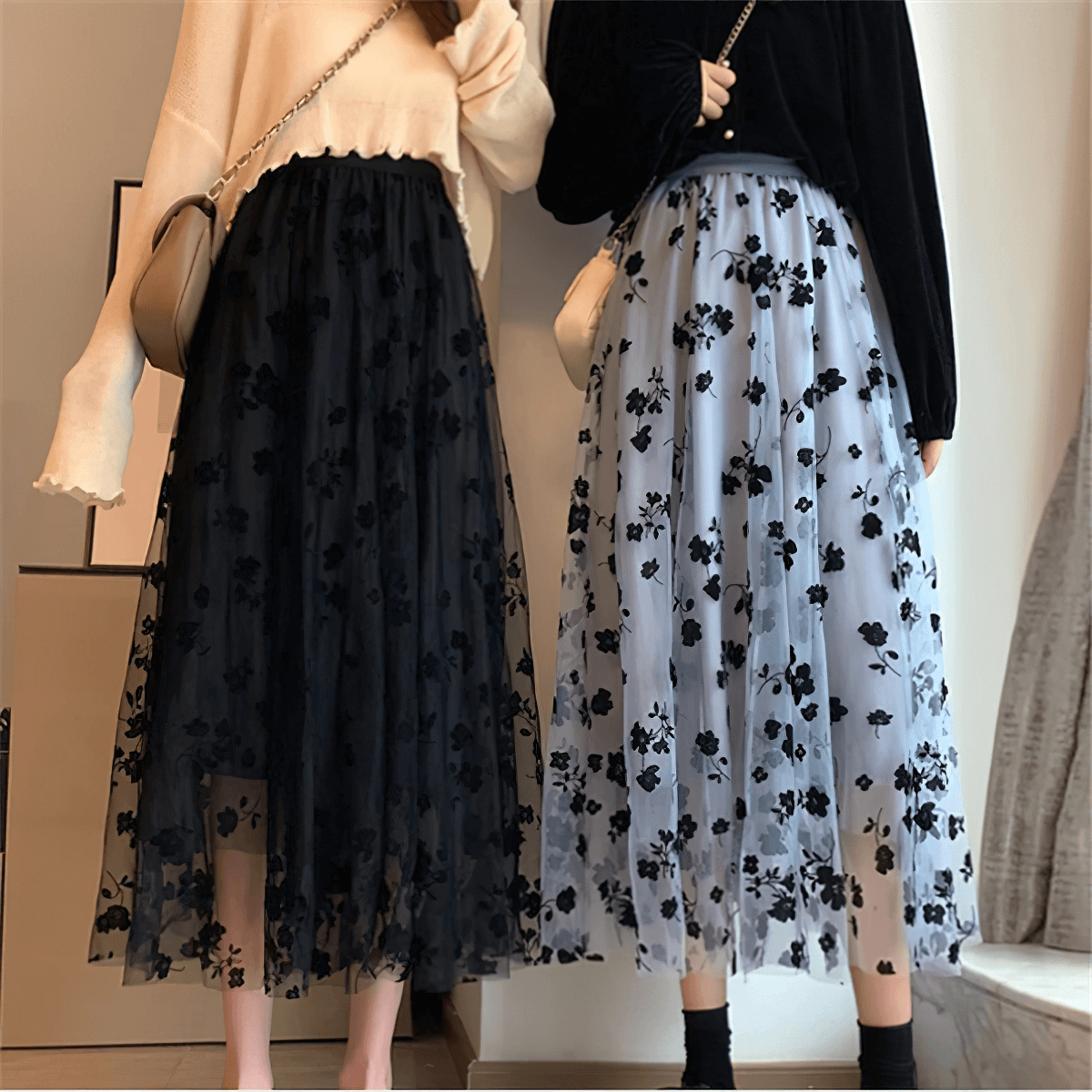 Pair of stylish women's high waist skirts with embroidered flowers in black and light blue mesh tulle.