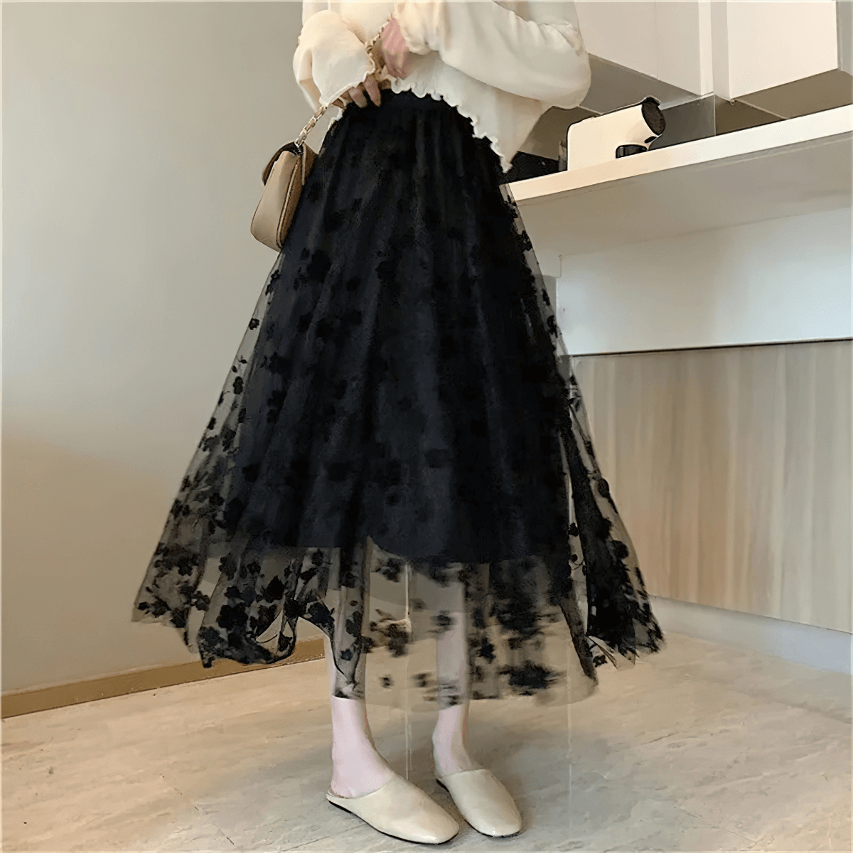 Stylish women's high waist skirt with embroidered flowers, elegant mesh tulle design in black.