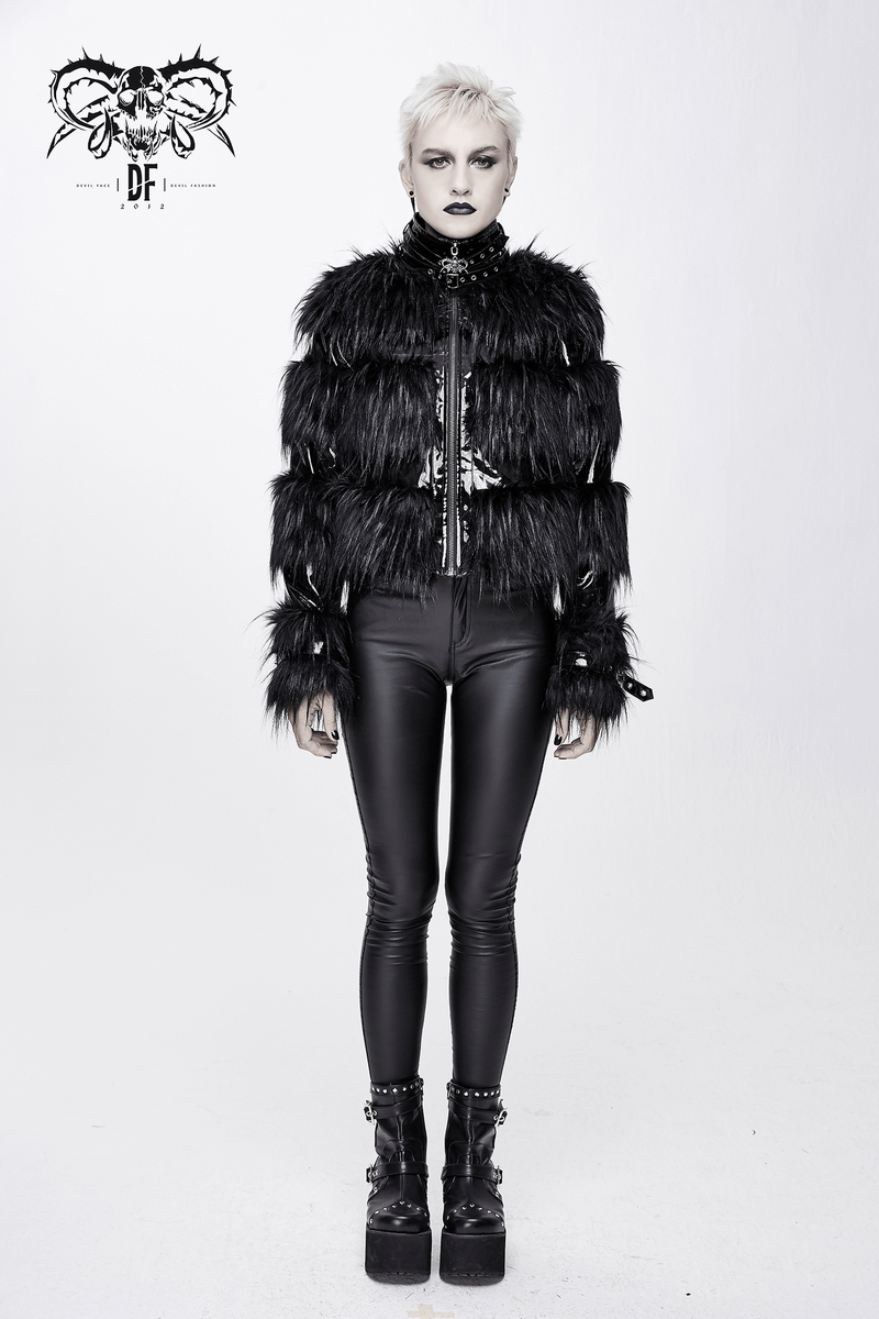 Stylish black fur jacket worn by a model in gothic attire, with shiny black pants and chunky boots.
