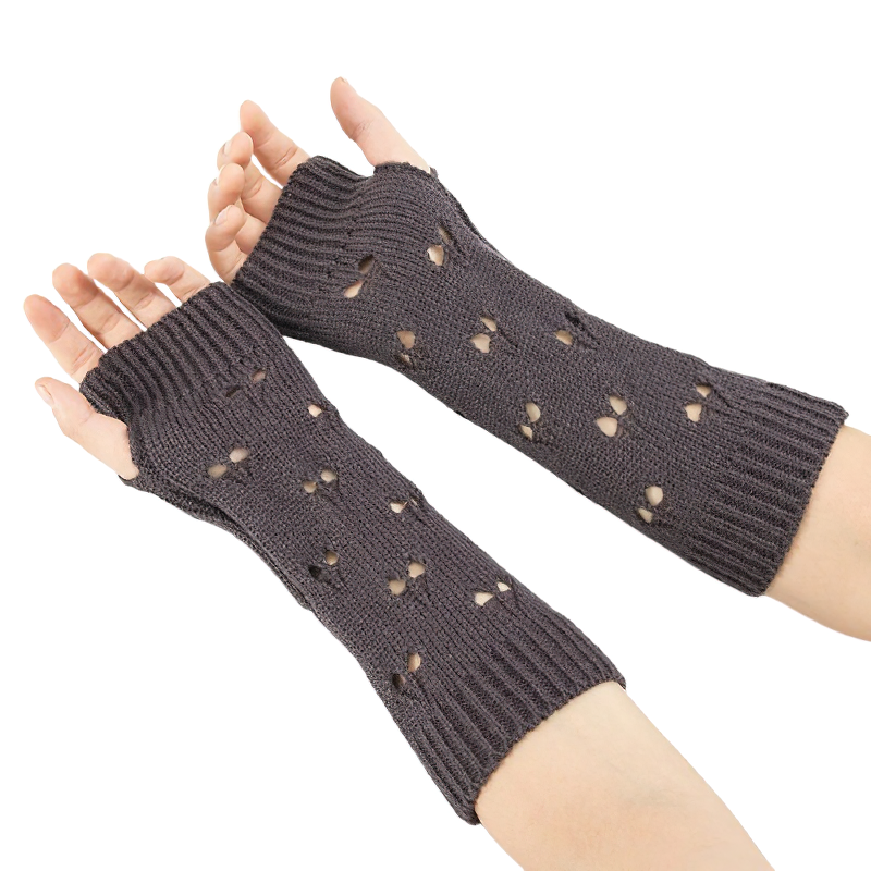 Stylish women's fingerless gloves with hollow heart design, perfect for cozy casual looks in cold weather.
