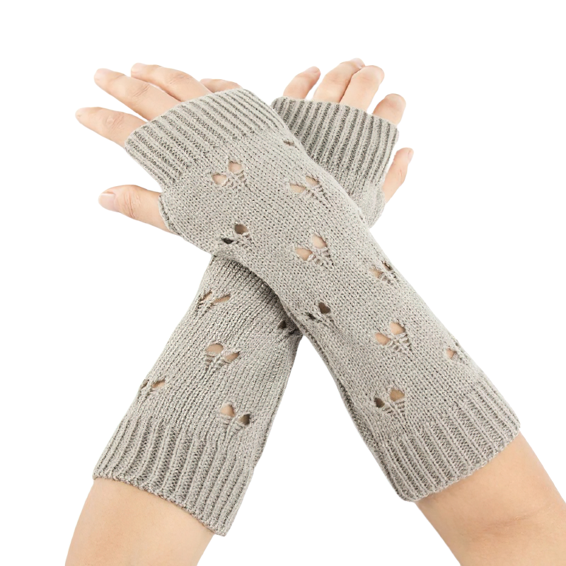 Stylish grey fingerless gloves with hollow heart design, perfect for women's casual outfits during cold weather.