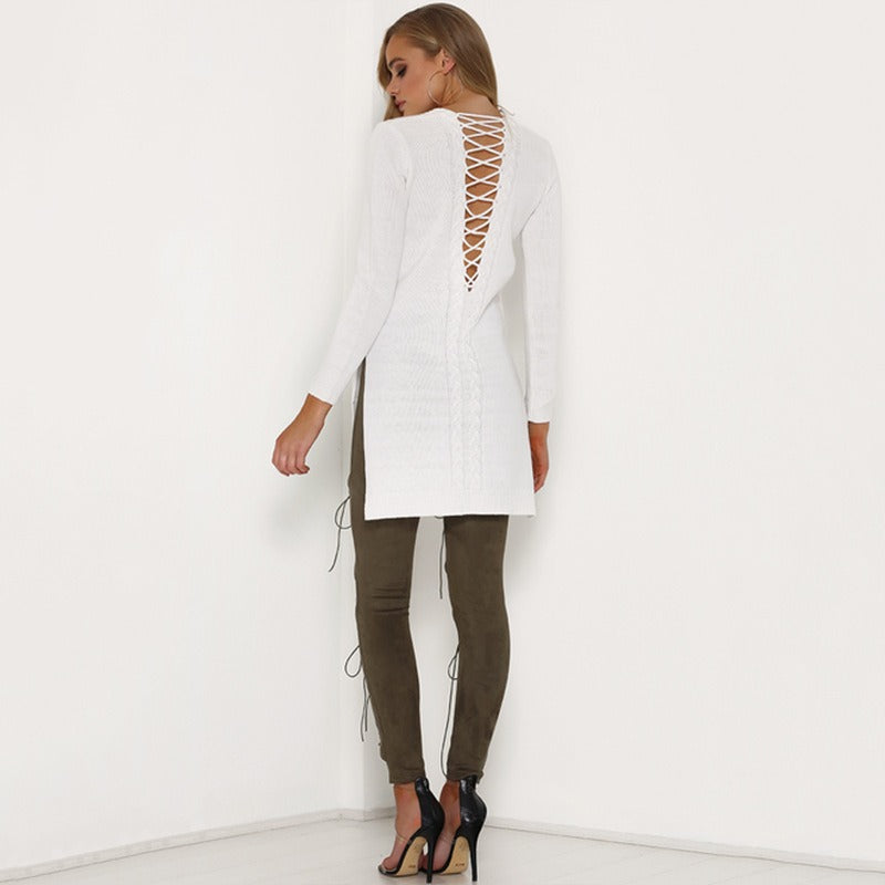 Model showcasing women's white lace-back top with olive suede bodycon bandage trousers and stylish heels.