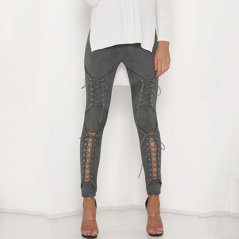 Women’s gray suede bodycon bandage trousers with lace-up design at knees and hips, perfect for goth and rock styles.