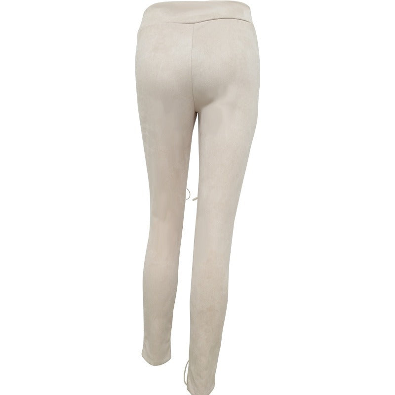 Back view of women's suede bodycon bandage trousers, showcasing unique slim fit and stylish leg design.