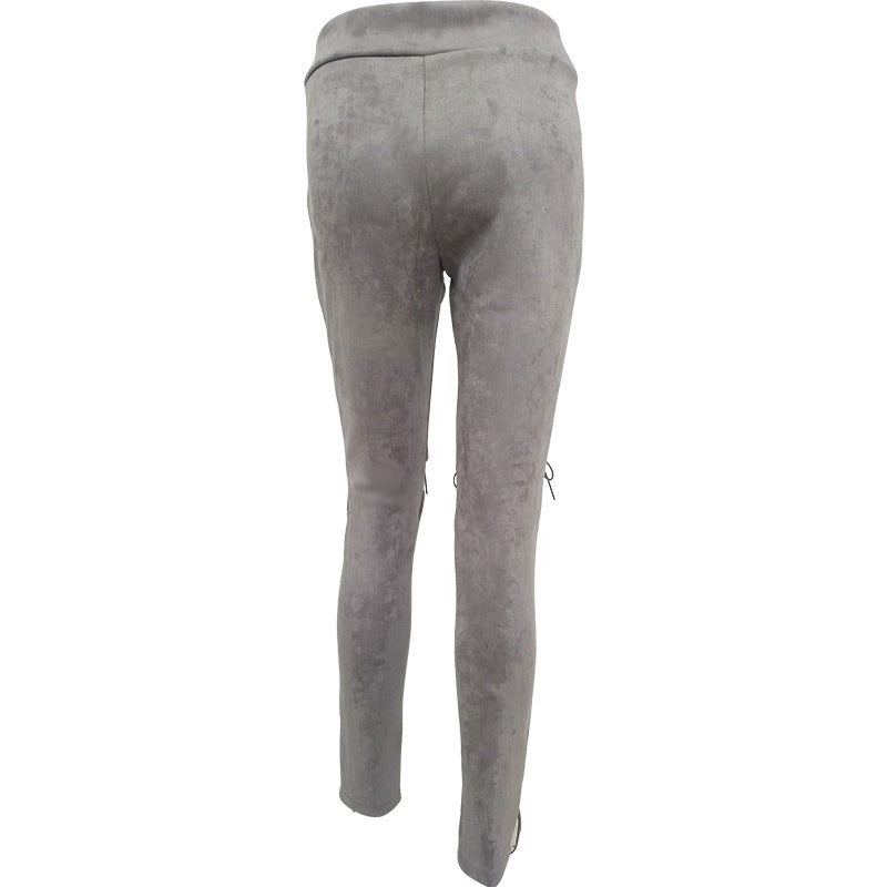 Back view of women's gray suede bodycon bandage trousers with lacing on knees for a gothic style look.
