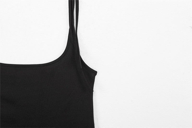 Close-up of women's summer black skirt shoulder straps in alternative fashion, showcasing spandex and polyester material.