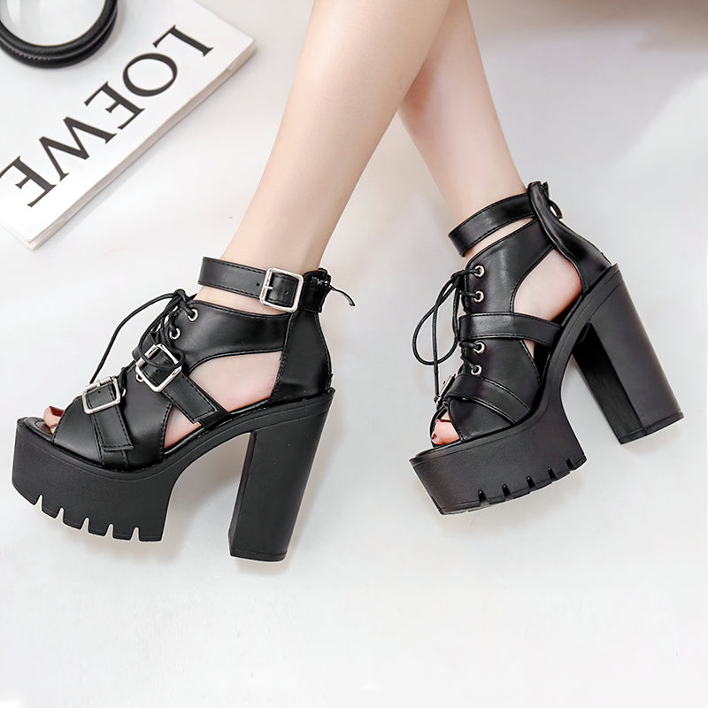 Stylish black high-heeled open toe shoes with lace-up and buckle, perfect for summer goth fashion.