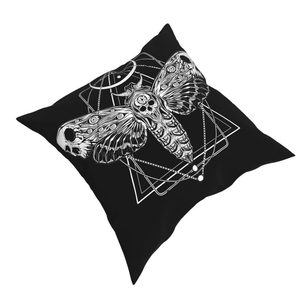 Gothic black pillow featuring a skull moth design and geometric patterns for unique home decor.