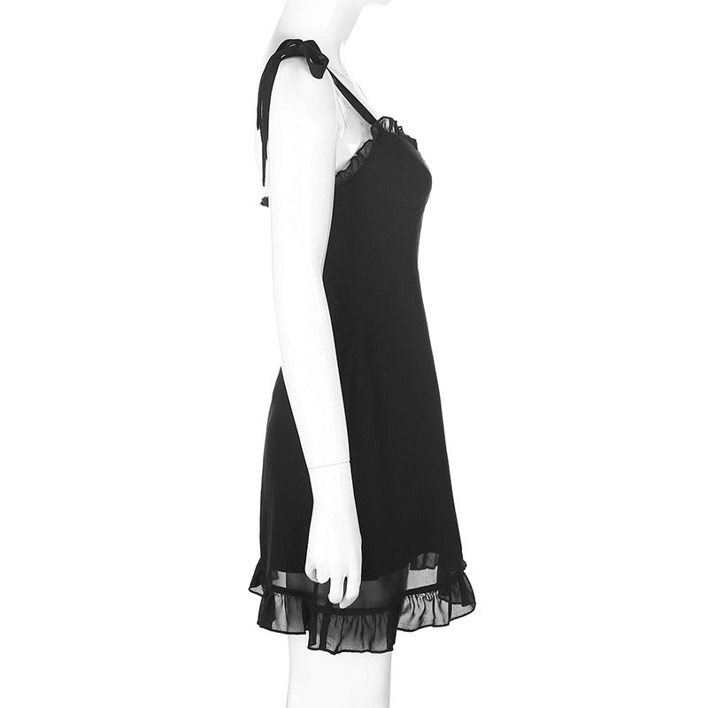 Black summer mini dress, fit and flare style with lace and bow straps, perfect for gothic fashion.